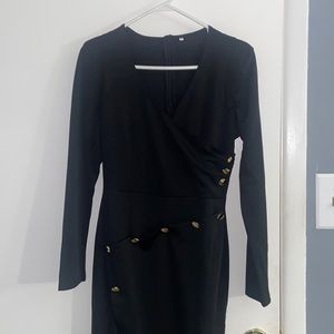 Black dress with shoulder pads